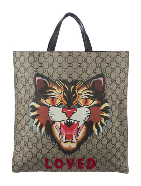 gucci supreme angry cat tote|Gucci GG Supreme Angry Cat Tote .